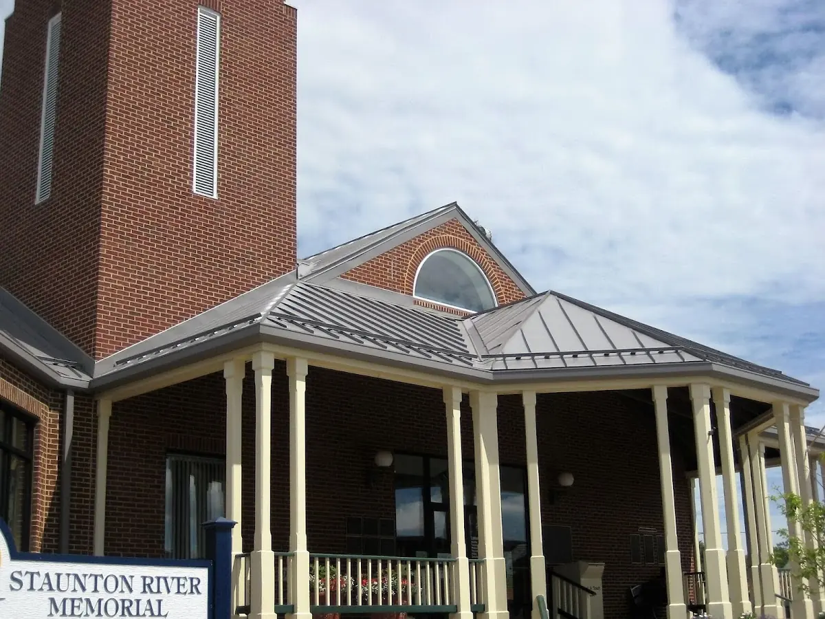 Skilled roofing craftsmen working on a residential roof in Covington